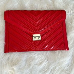 Red patent envelope clutch